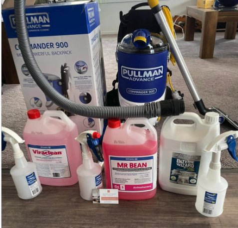 Professional backpack vacuum and cleaning solutions showing the equipment behind our cleaning services