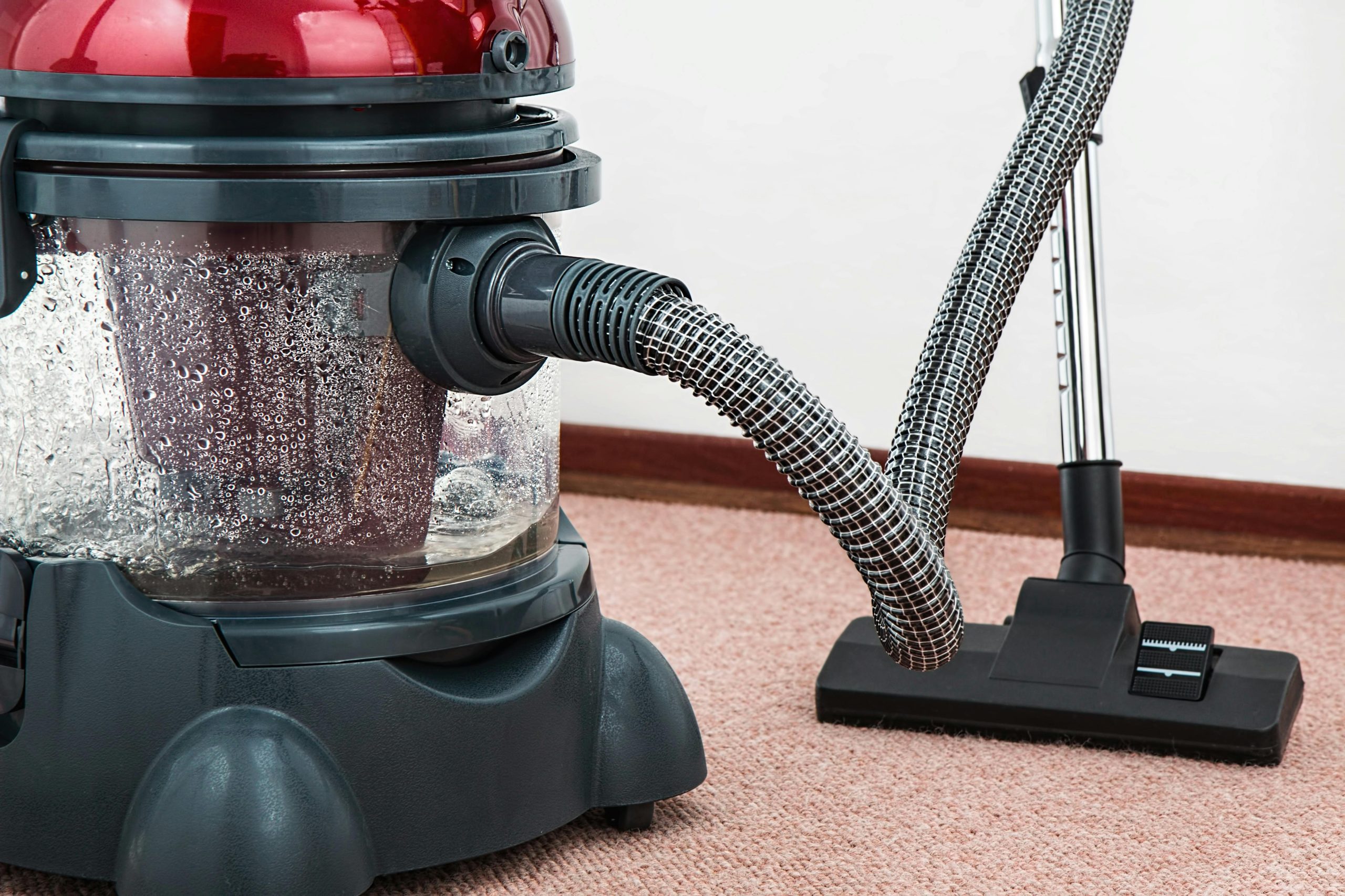 Professional wet extraction vacuum for deep carpet cleaning